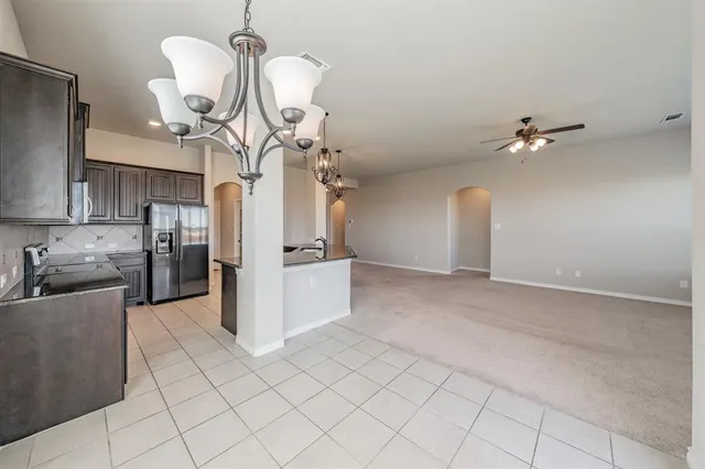 a view of a kitchen with cabinets