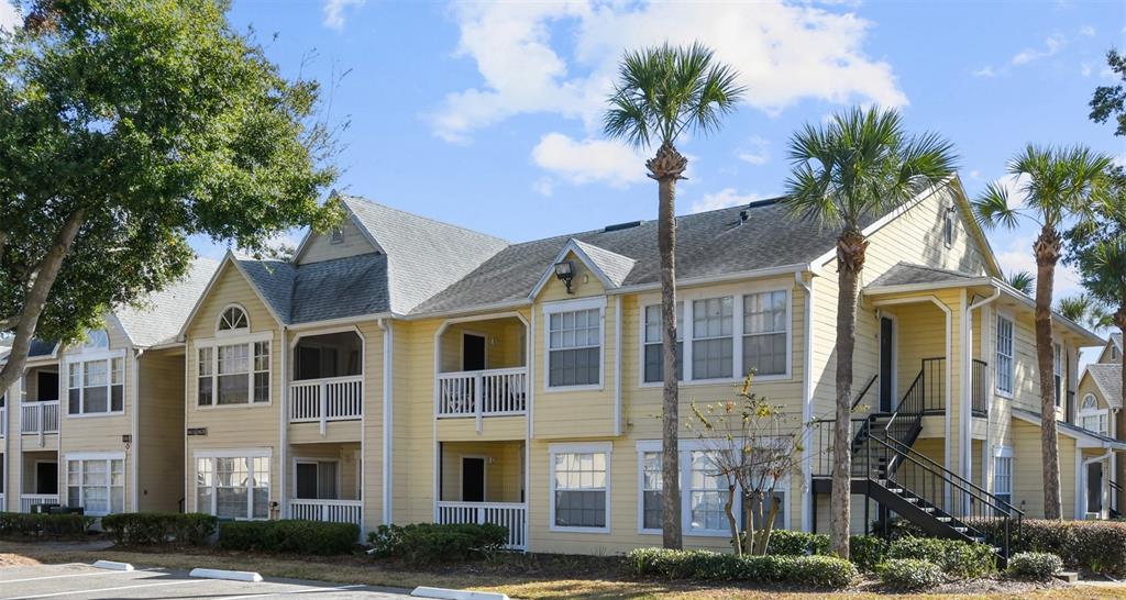 1063 South Hiawassee Road, Unit 1616 Orlando, FL 32835 - Photo 1 of 1 a front view of a multi story residential apartment buildings
