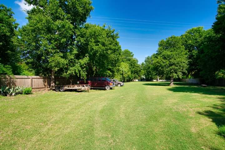 1104 Perry Road Austin, TX 78721 - Photo 10 of 15 a swimming pool with wooden fence