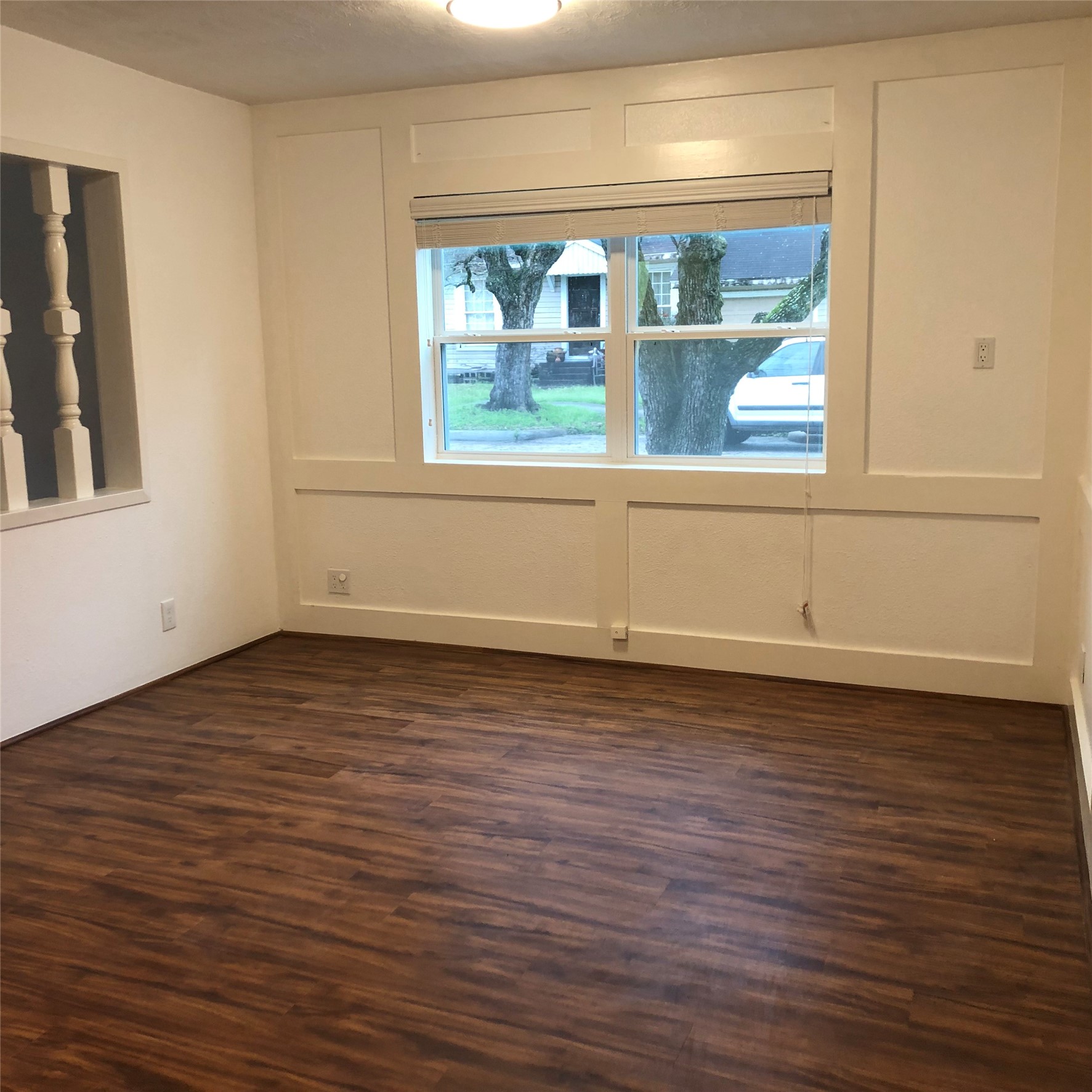4236 Ruskin Street Houston, TX 77005 - Photo 5 of 19 Dining area with block paneling and large window.