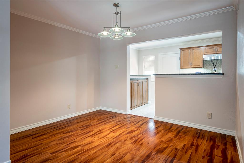 10757 Villager Road, Unit B Dallas, TX 75230 - Photo 5 of 36 Dining area with open kitchen design
