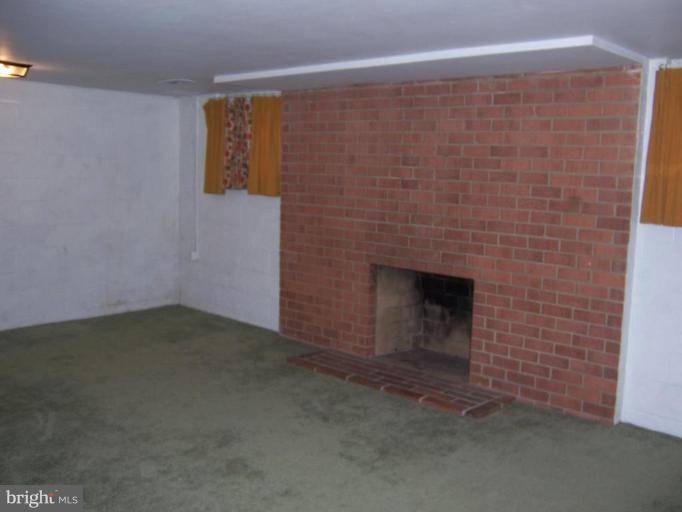302 Sisson Street Silver Spring, MD 20902 - Photo 20 of 30 With cozy fireplace!