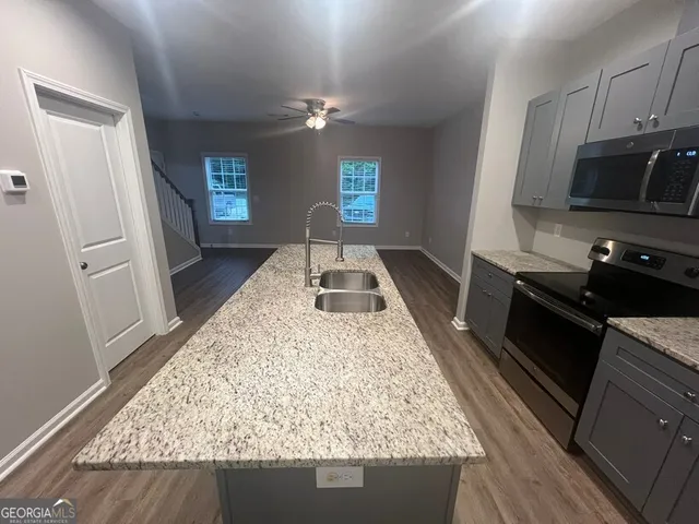 a bathroom with sink and mirror