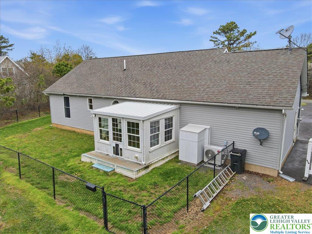 64 Robertson Road Jim Thorpe, PA 18229 - Photo 47 of 54 a view of a house with backyard sitting area and garden