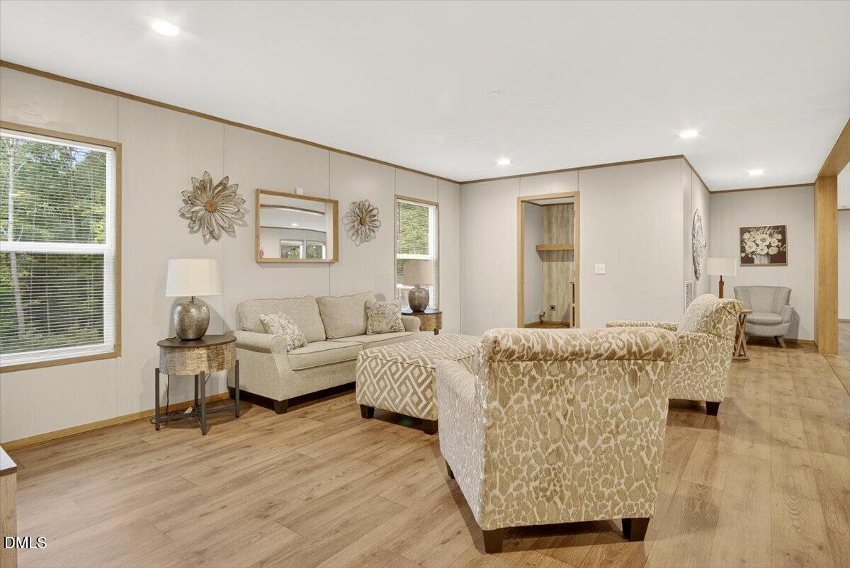 532 Plum Nutty Road Henderson, NC 27537 - Photo 12 of 38 a living room with furniture and a window