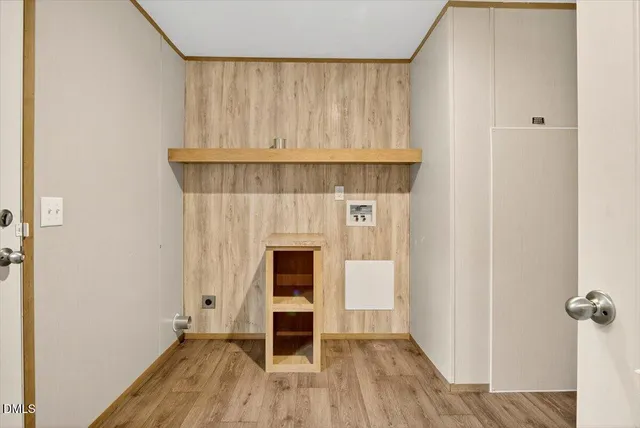 a view of a livingroom with wooden floor
