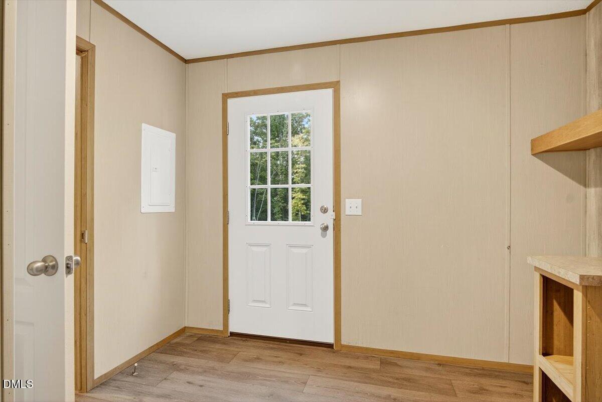 532 Plum Nutty Road Henderson, NC 27537 - Photo 28 of 38 a view of an empty room with wooden floor and closet
