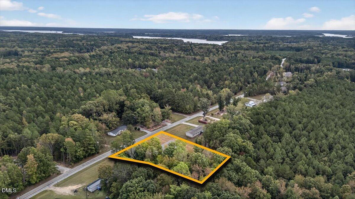 532 Plum Nutty Road Henderson, NC 27537 - Photo 30 of 38 an aerial view of a residential houses with city and green space