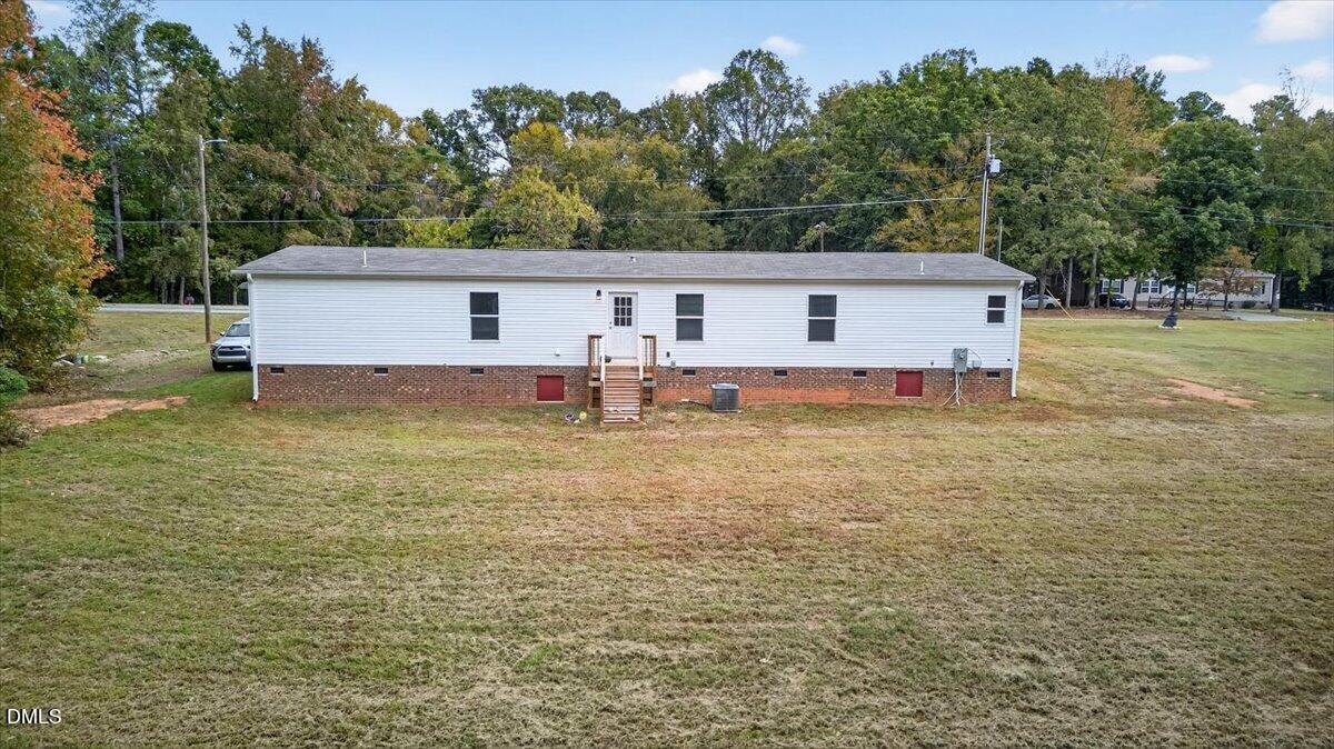 532 Plum Nutty Road Henderson, NC 27537 - Photo 36 of 38 a view of a house with a yard
