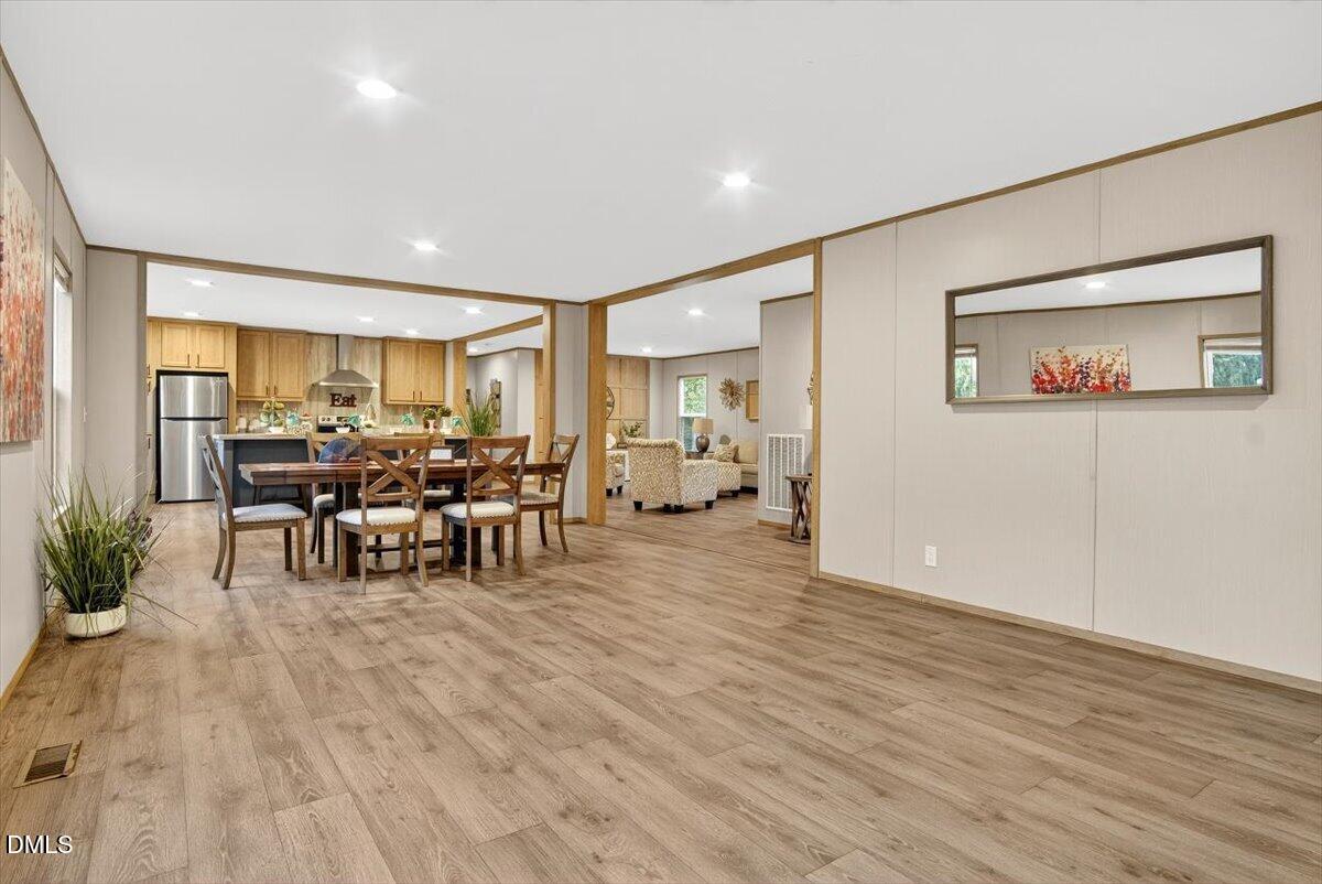 532 Plum Nutty Road Henderson, NC 27537 - Photo 6 of 38 a living room with furniture and a large window