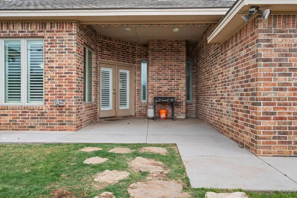 a view of a porch with a bench