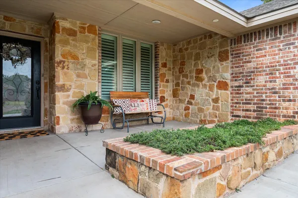 a garden view with a seating space