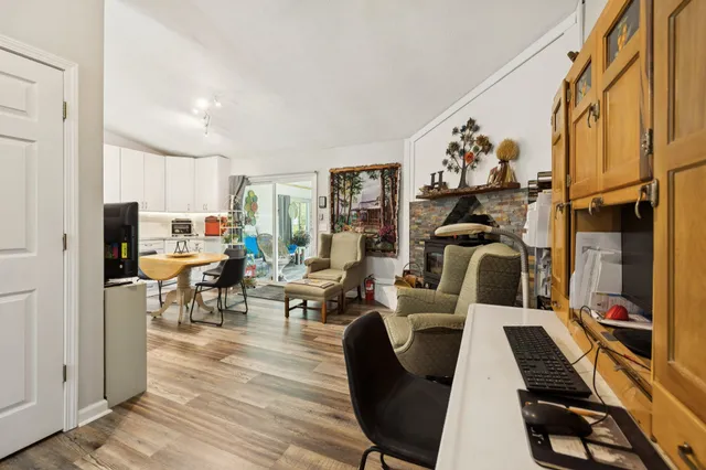 a view of a dining room with furniture window and outside view