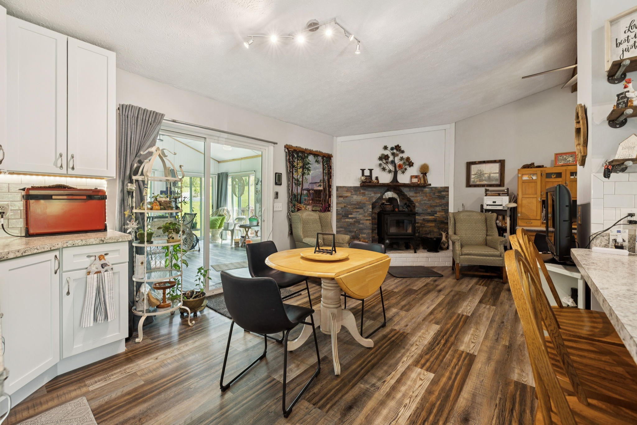 255 St Mary's Road Buffalo Valley, TN 38548 - Photo 16 of 61 a living room with furniture a wooden floor and a flat screen tv