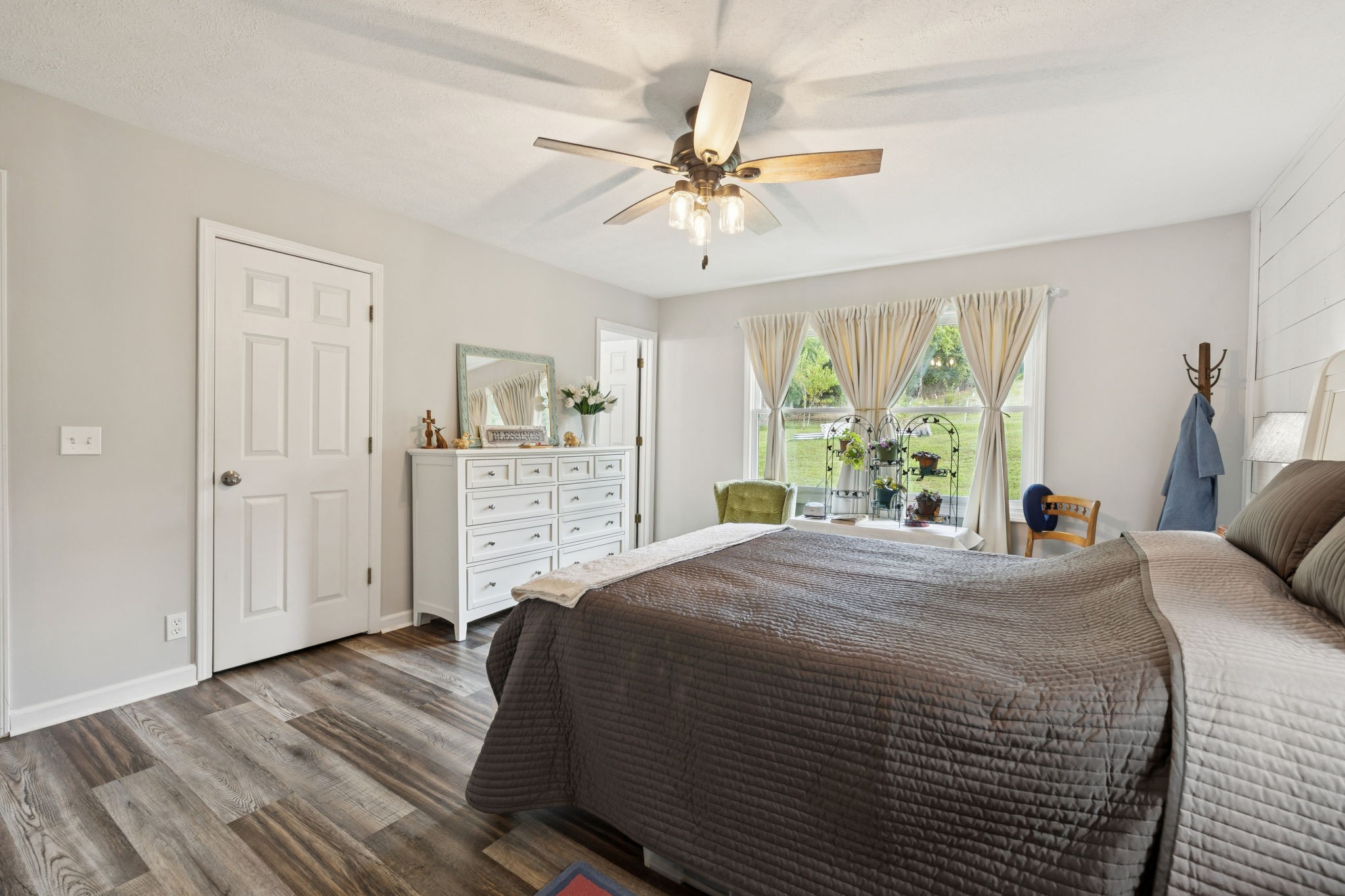 255 St Mary's Road Buffalo Valley, TN 38548 - Photo 41 of 61 a bedroom with a bed and a chandelier