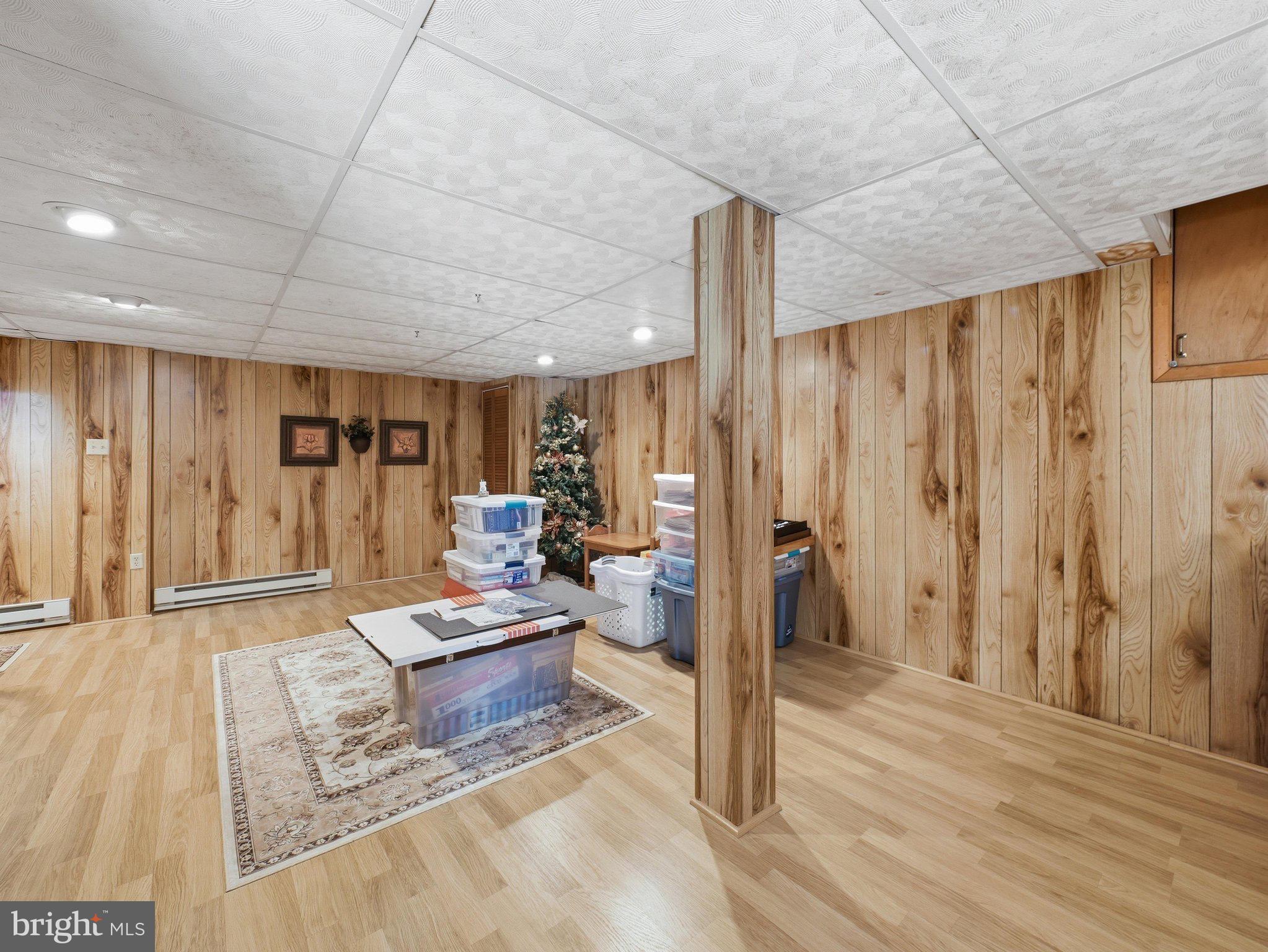 2606 Ridge Road South Martinsburg, WV 25403 - Photo 38 of 57 Spacious basement with warm wood accents.