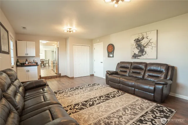 a living room with furniture and a couch