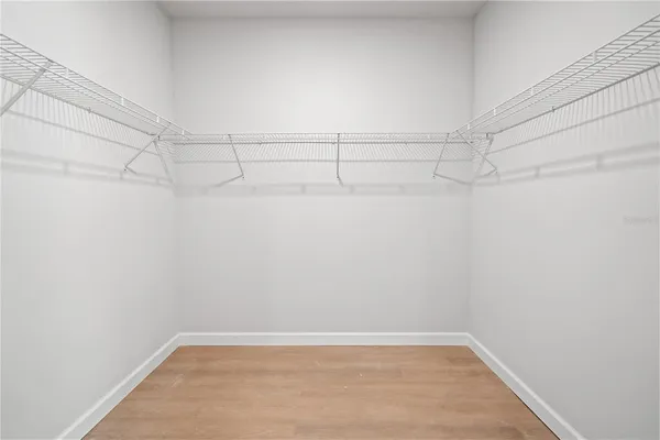 a view of a room with racks on the wall