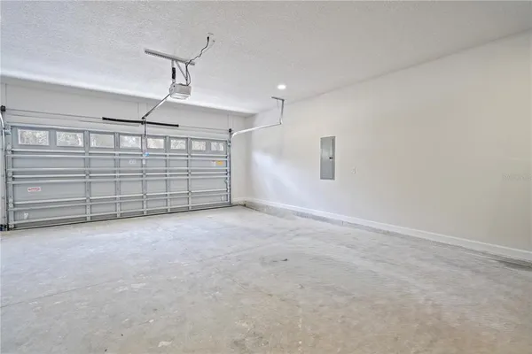 a balcony view with a glass door