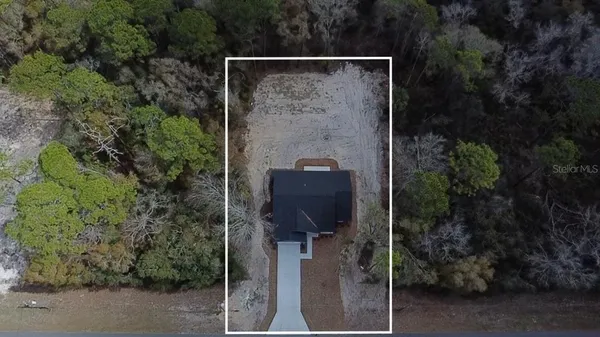 a view of empty room with trees