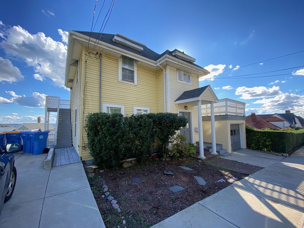 41 Harbor View Avenue Winthrop, MA 02152 - Photo 2 of 27 a front view of a house with garden