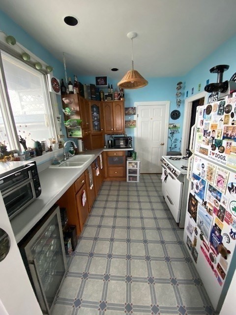 41 Harbor View Avenue Winthrop, MA 02152 - Photo 22 of 27 a kitchen with a sink appliances and cabinets