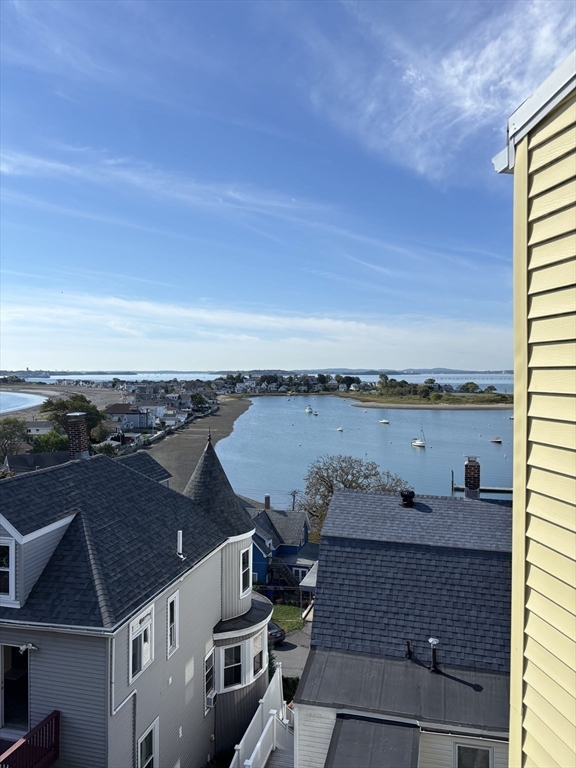 41 Harbor View Avenue Winthrop, MA 02152 - Photo 9 of 27 an aerial view of a house with a lake view