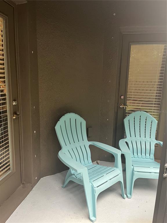 17361 Old Tobacco Road Lutz, FL 33558 - Photo 12 of 27 a view of a chair in the patio