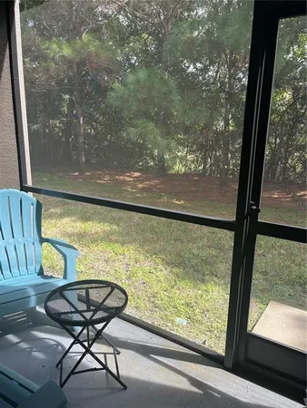 a view of backyard with green space