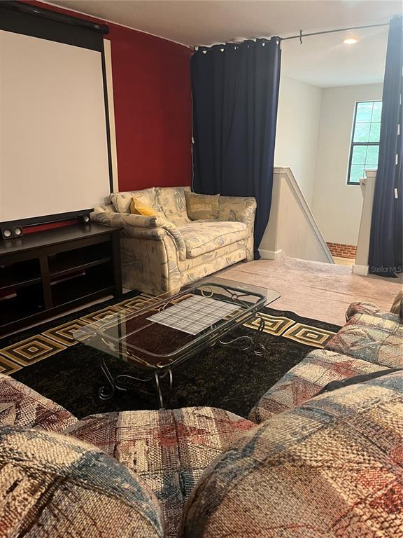 17361 Old Tobacco Road Lutz, FL 33558 - Photo 21 of 27 a bedroom with a bed and a dresser