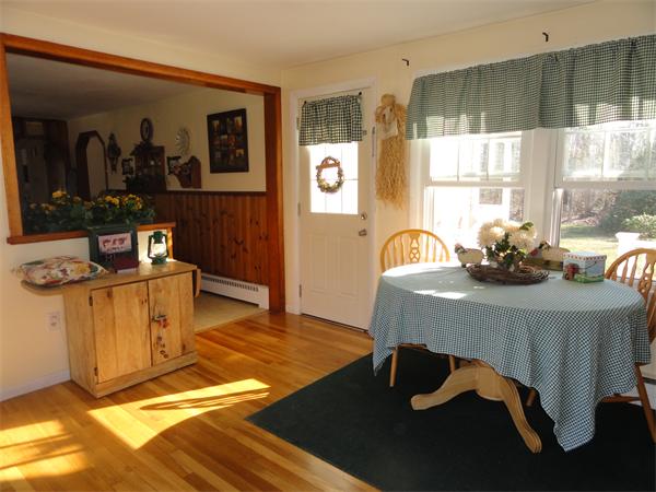 50 Paddock Road Rutland, MA 01543 - Photo 12 of 22 a bedroom with a bed and wooden floor