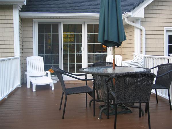 50 Paddock Road Rutland, MA 01543 - Photo 21 of 22 a balcony with table and chairs