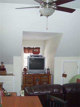 50 Paddock Road Rutland, MA 01543 - Photo 5 of 22 a living room with furniture and a flat screen tv