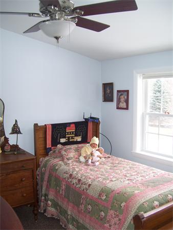 50 Paddock Road Rutland, MA 01543 - Photo 6 of 22 a bedroom with a bed and a window