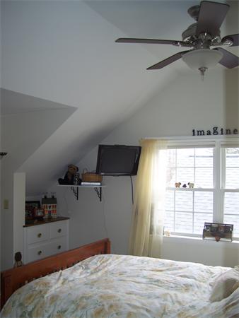 50 Paddock Road Rutland, MA 01543 - Photo 7 of 22 a bedroom with a bed and window