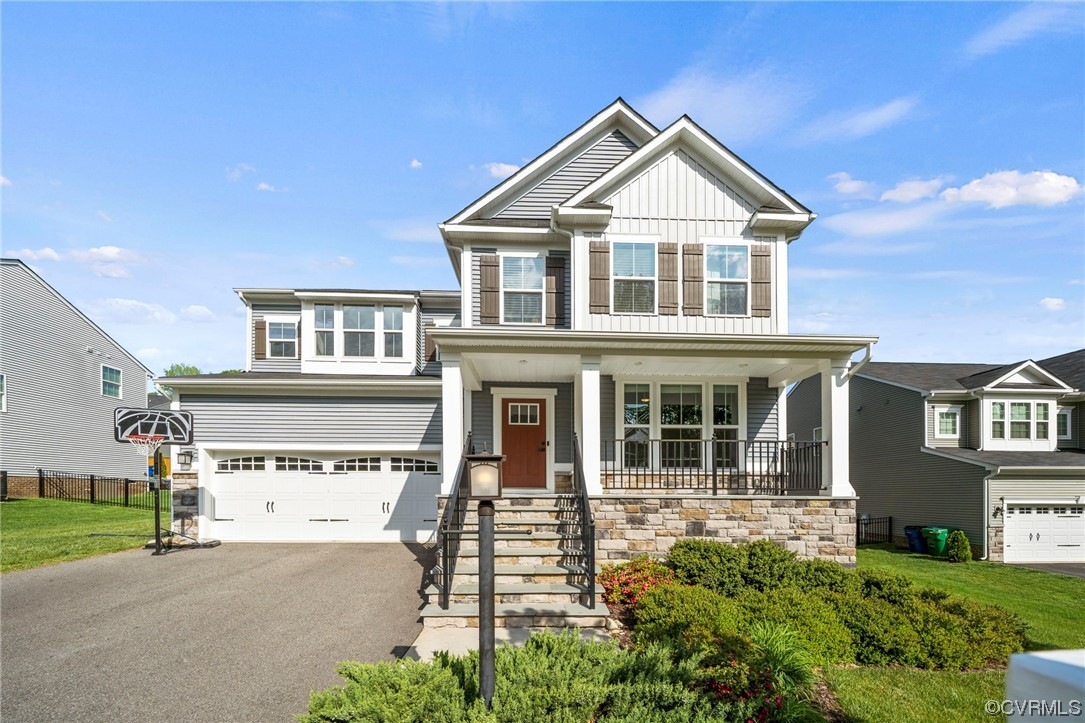 a view of a house with a yard and plants