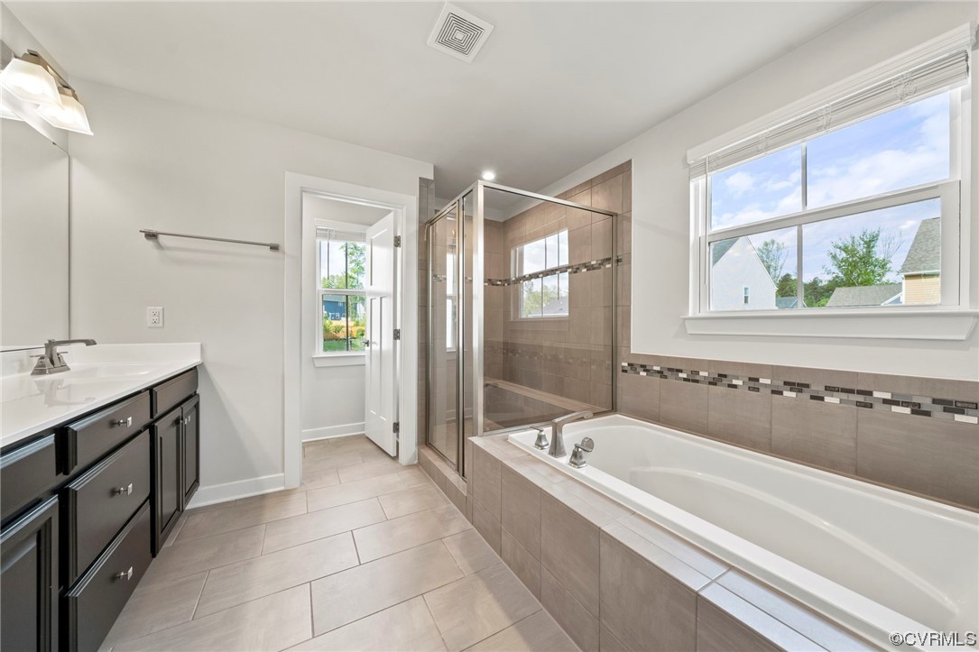 4125 Cambrian Circle Midlothian, VA 23112 - Photo 14 of 21 a spacious bathroom with a tub shower and sink