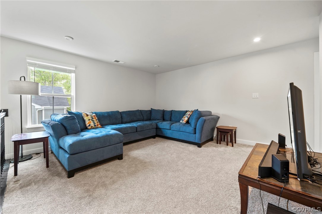 4125 Cambrian Circle Midlothian, VA 23112 - Photo 15 of 21 a living room with furniture and a flat screen tv