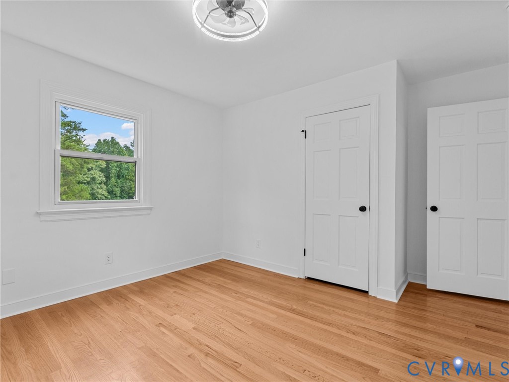 7361 Creek Ridge Road Henrico, VA 23231 - Photo 36 of 51 Light wood-finish flooring, white walls, multiple