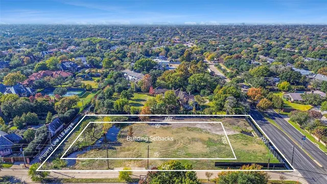 a view of a lake with a yard