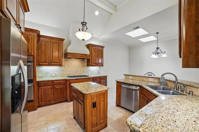 a view of a room with table and chairs