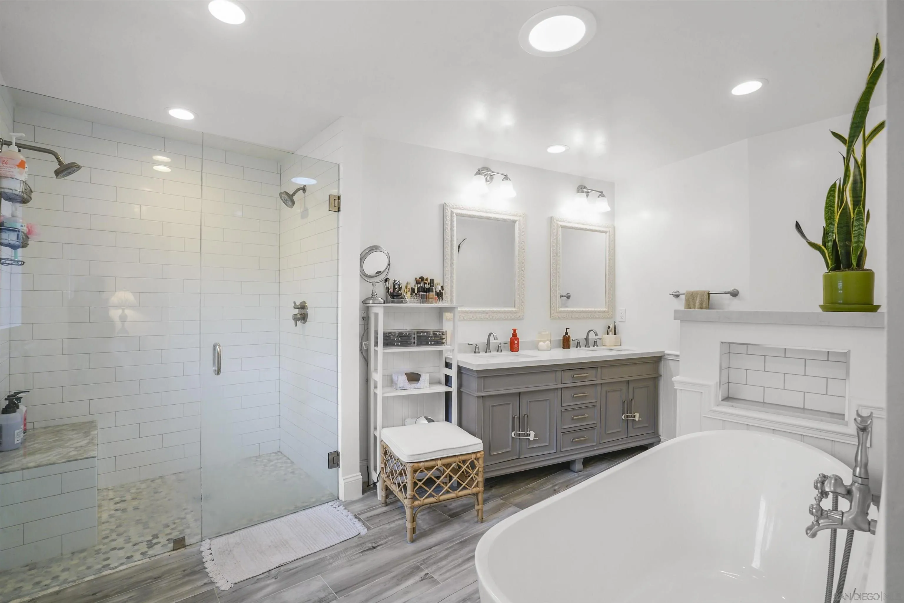 1235 Blue Sky Drive Cardiff, CA 92007 - Photo 17 of 35 a bathroom with a tub sink and mirror