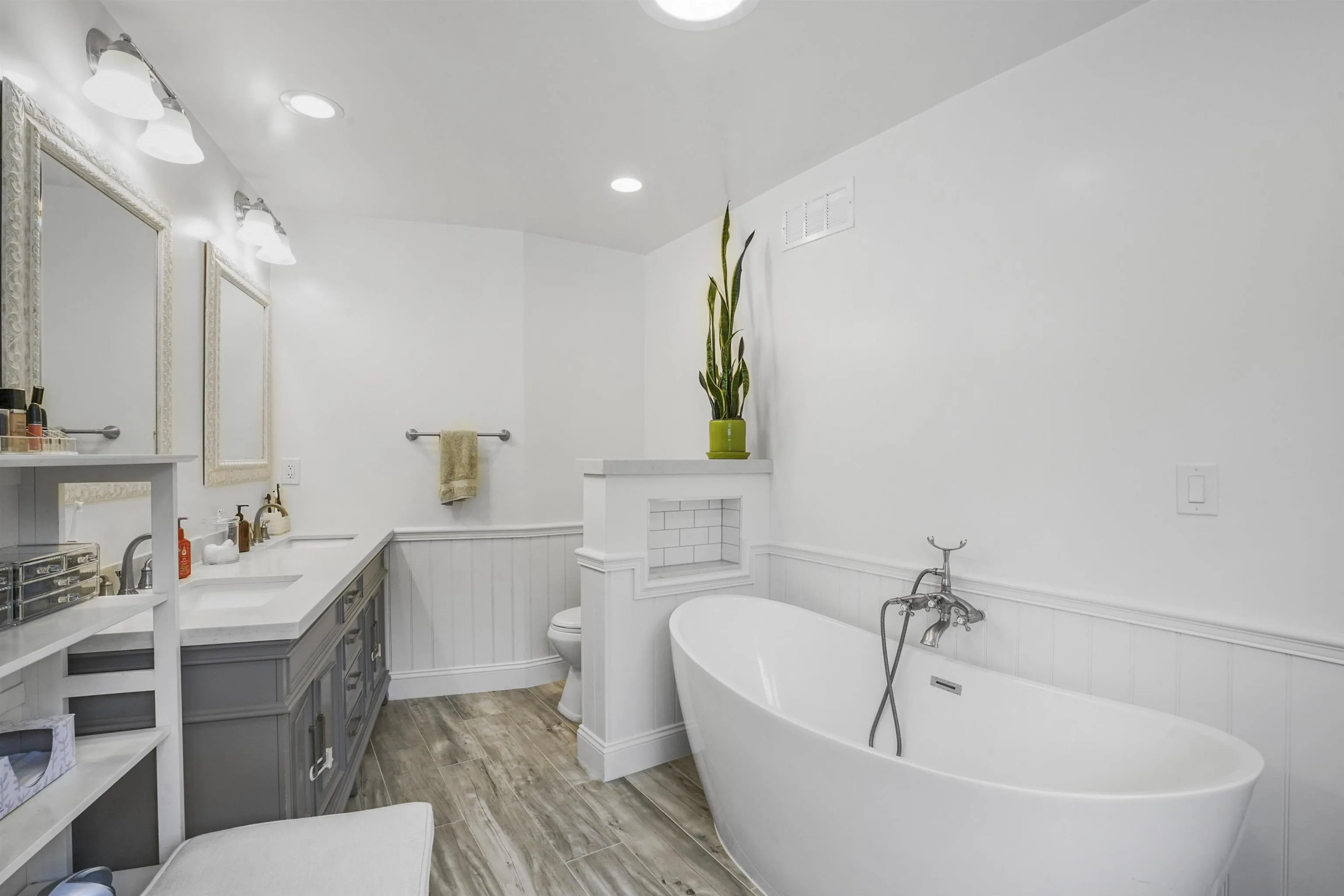 1235 Blue Sky Drive Cardiff, CA 92007 - Photo 18 of 35 a white bath tub sitting next to a white toilet and sink
