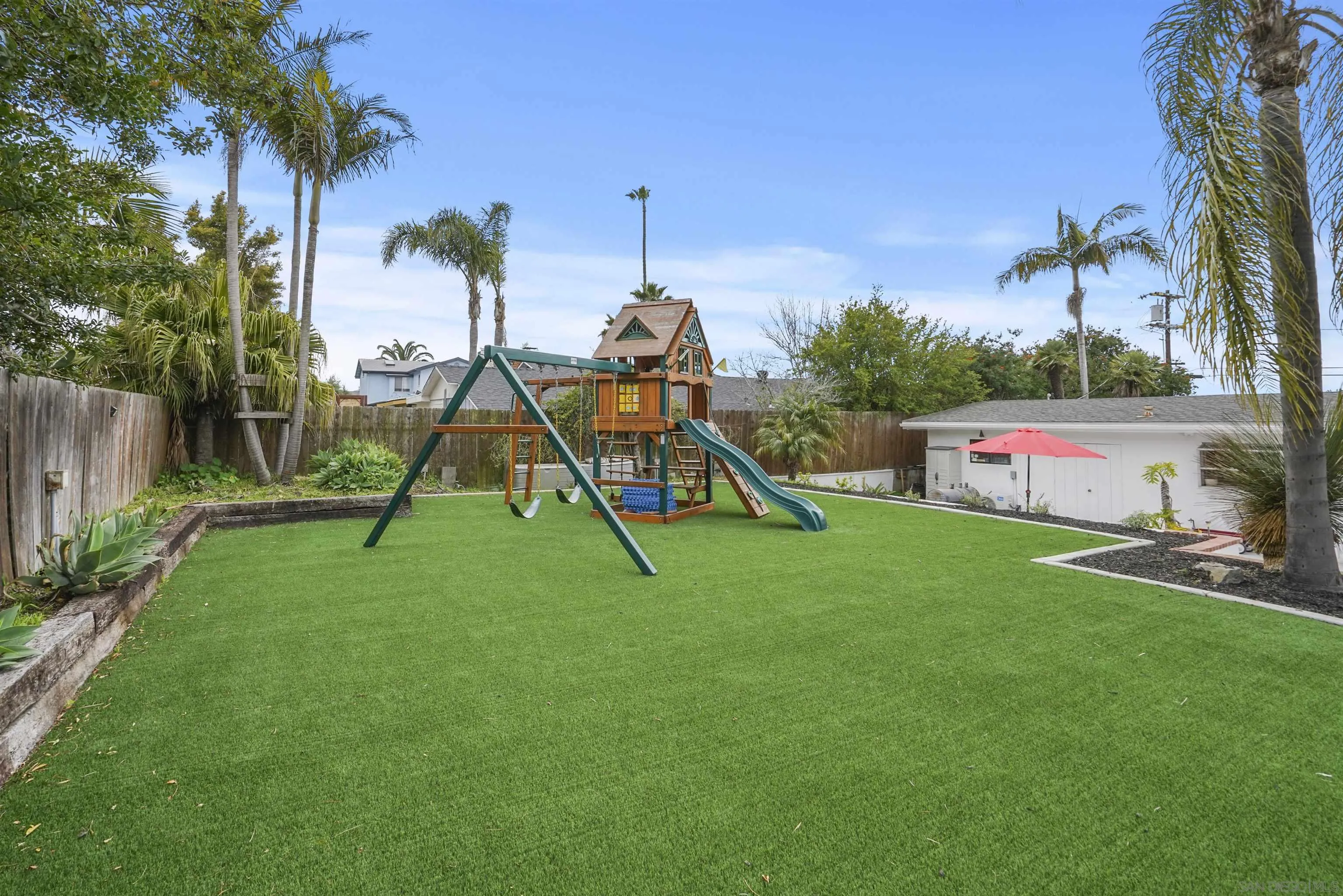 1235 Blue Sky Drive Cardiff, CA 92007 - Photo 2 of 35 a view of a park with a slide