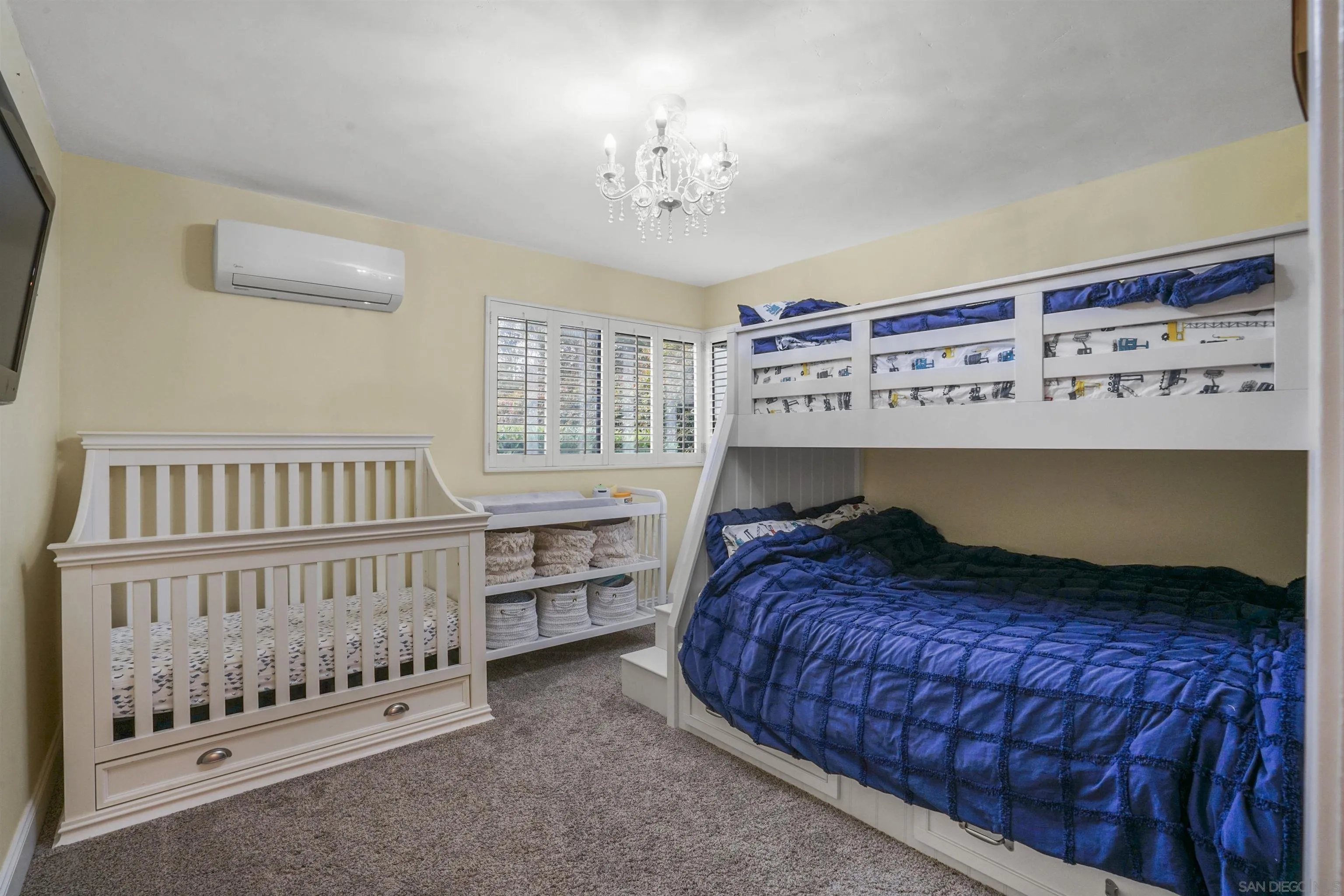 1235 Blue Sky Drive Cardiff, CA 92007 - Photo 21 of 35 a bedroom with a bed and window