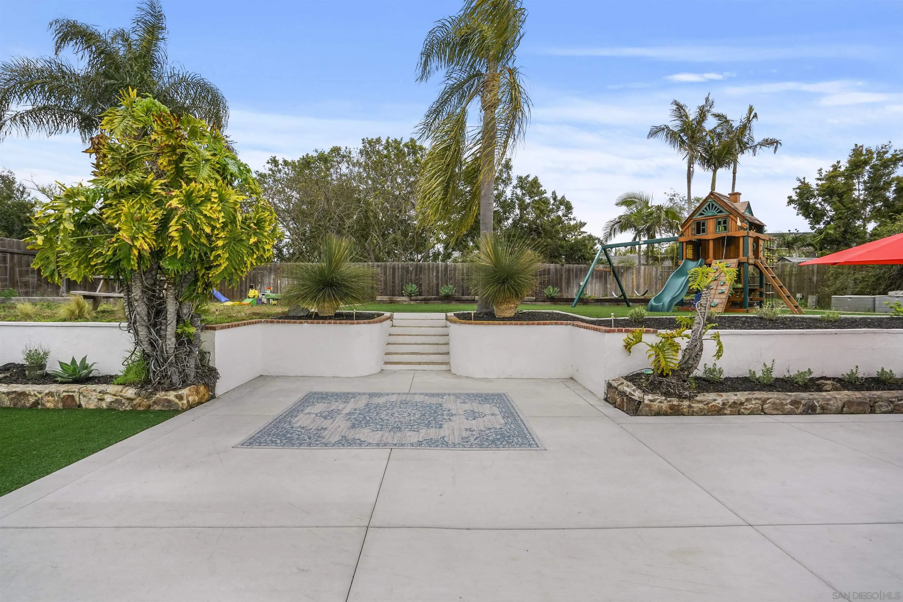 1235 Blue Sky Drive Cardiff, CA 92007 - Photo 26 of 35 a view of a yard with palm trees