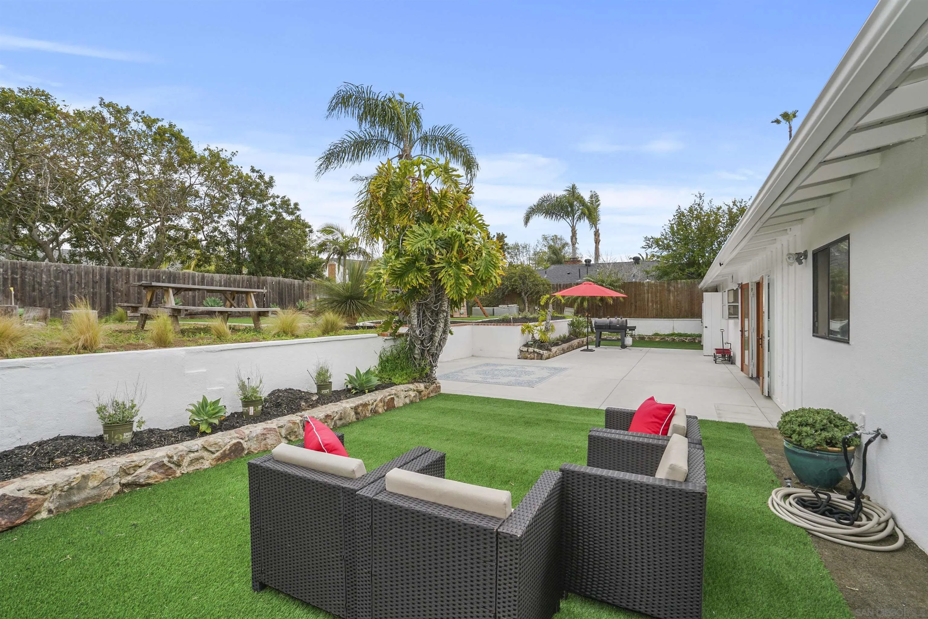 1235 Blue Sky Drive Cardiff, CA 92007 - Photo 28 of 35 a view of a house with backyard and sitting area
