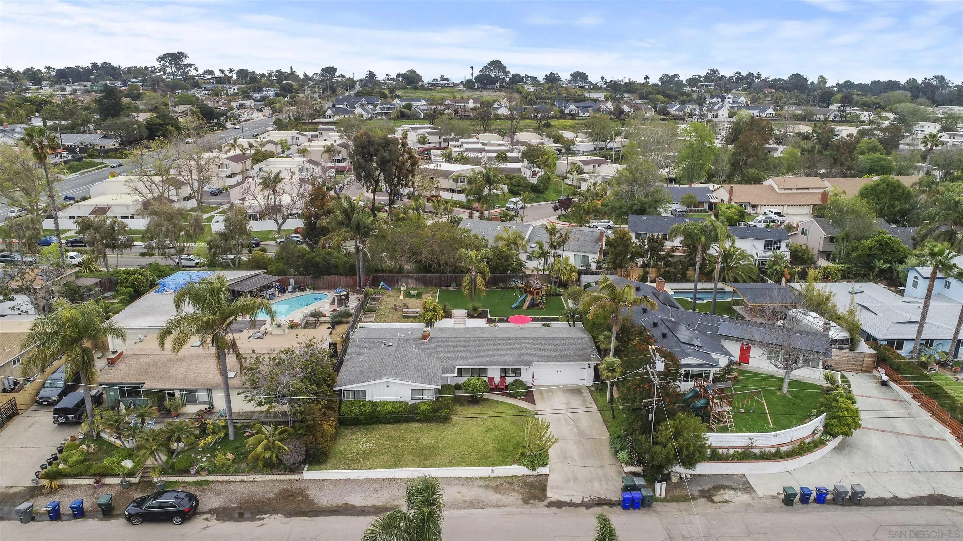 1235 Blue Sky Drive Cardiff, CA 92007 - Photo 32 of 35 an aerial view of a house with a yard and lake view