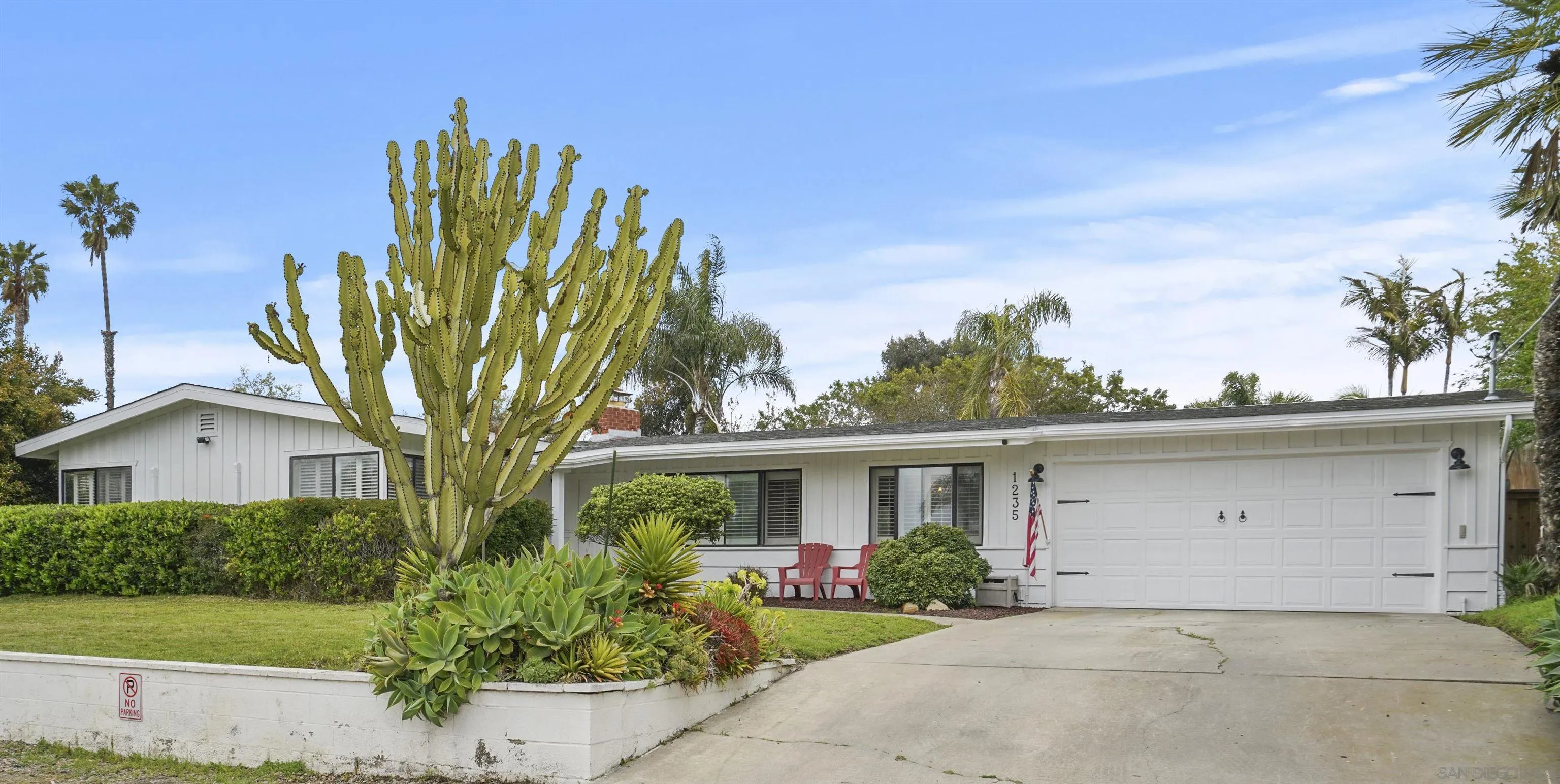 1235 Blue Sky Drive Cardiff, CA 92007 - Photo 33 of 35 a front view of a house with a garden