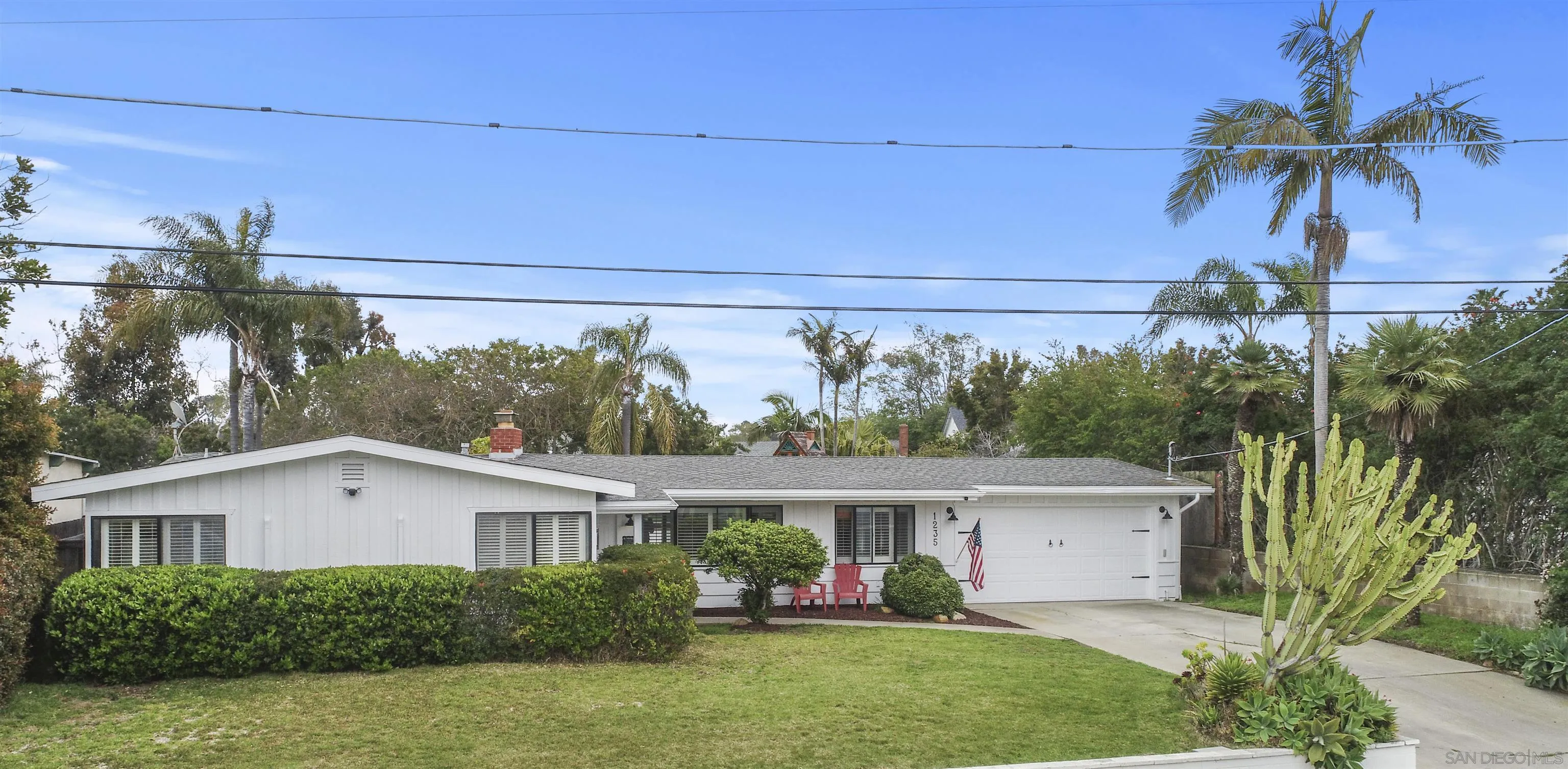 1235 Blue Sky Drive Cardiff, CA 92007 - Photo 34 of 35 a front view of house with yard and green space